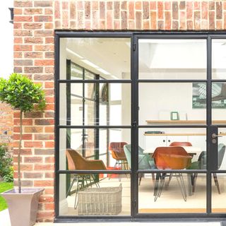 orangery with crittall style glazing and brick walls
