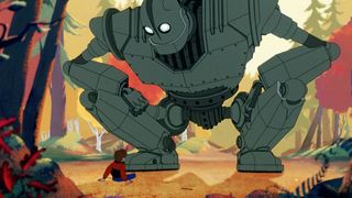 The Iron Giant sits in a forest in The Iron Giant