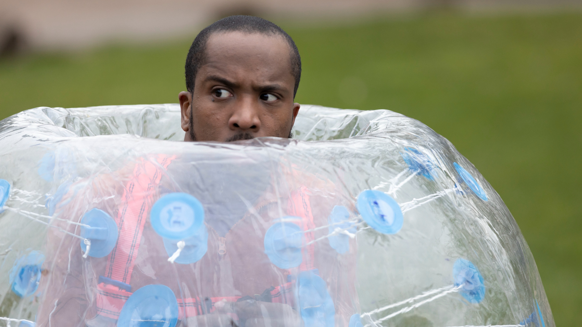Mike (Kiell Smith-Bynoe) in Ghosts in a zorb ball