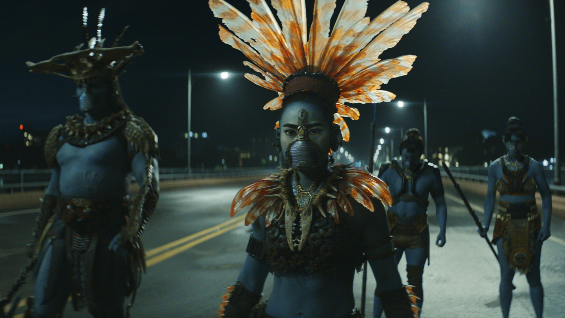 Namora, Attuma, and other Talokanil stand on a Chicago-based bridge in Black Panther 2