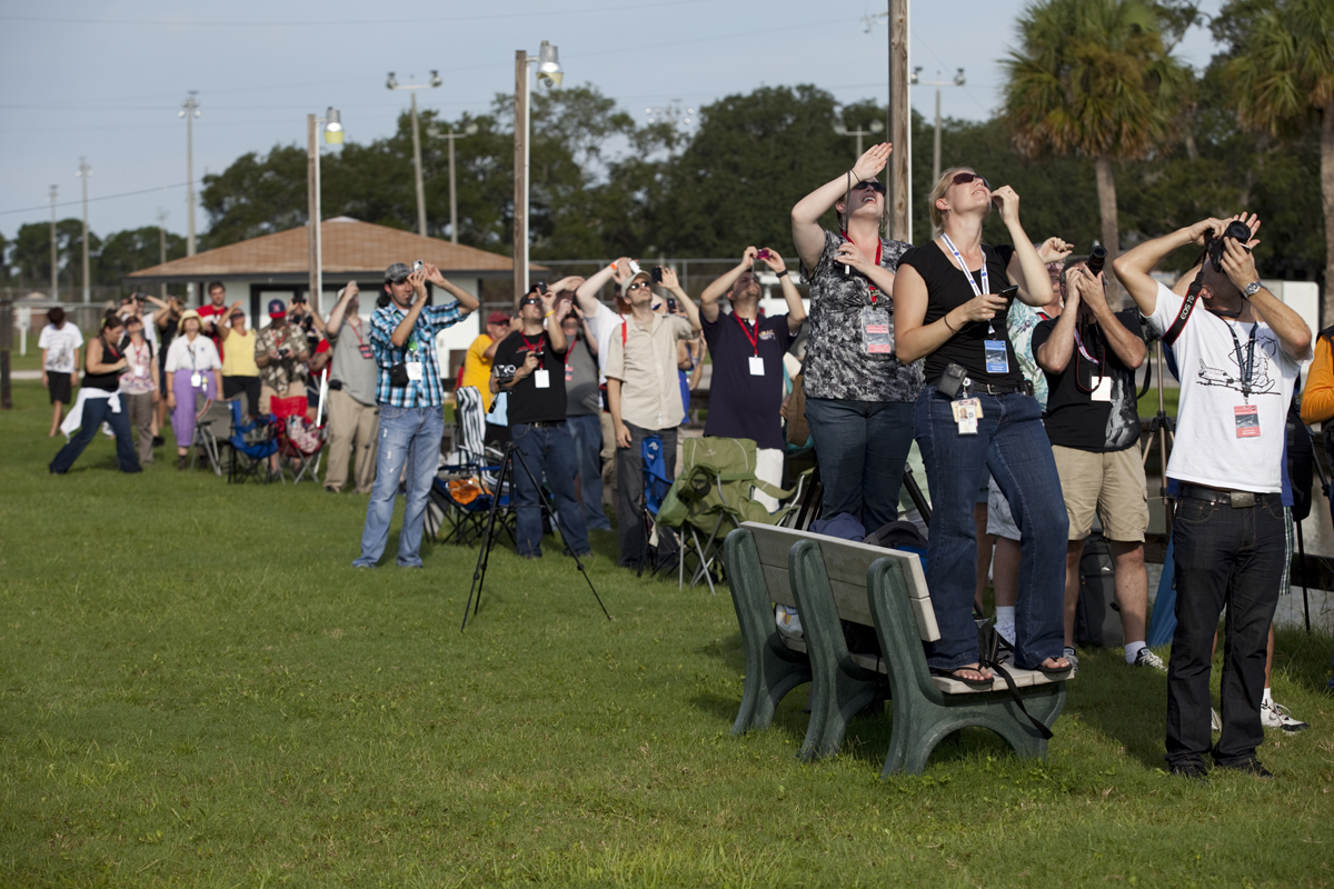 At KARS Park 1 on Merritt Island in Florida, a group of Tweetup participants watch excitedly as a Delta 2 Heavy rocket lifts off at 9:08 a.m. EDT on Sept. 10, 2011, carrying NASA’s Gravity Recovery and Interior Laboratory (GRAIL) mission to the moon. The 