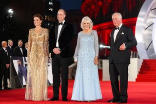 King Charles, Queen Camilla, Prince Willam, and Kate Middleton at the James Bond premiere