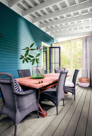 a three season sunroom on a veranda