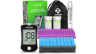 Auvon DS-W Blood Sugar Test Kit review: An image showing the black meter sat next to blue test strips