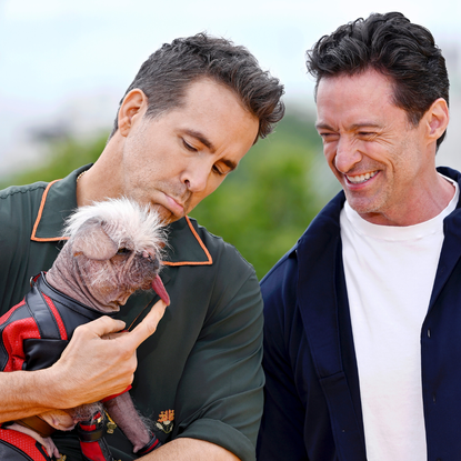 Ryan Reynolds, Peggy aka Dogpool the “UK’s Ugliest Dog Winner” and Hugh Jackman attend the photocall for "Deadpool & Wolverine" at the IET Building, Savoy Place on July 12, 2024 in London, England.