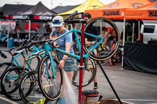 Brenna Wrye-Simpson cleaning off the bikes