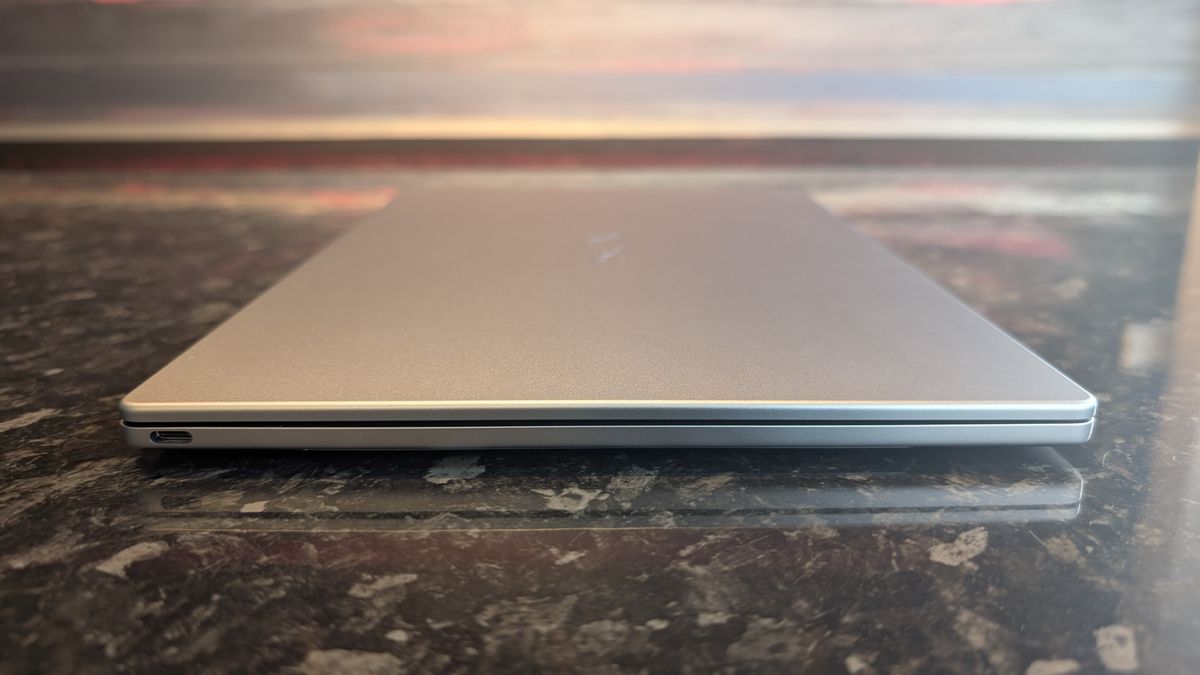The Dell XPS 13 (2026) laptop pictured on a black marble worktop.