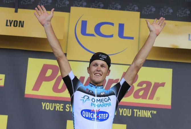 Matteo Trentin (Omega Pharma-Quick Step) savours his moment on the stage winner's podium