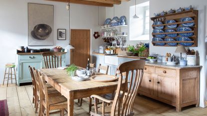 Rustic kitchen with pine table and open shelves