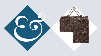 a woven staircase storage basket with handles