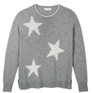 grey jumper with white stars