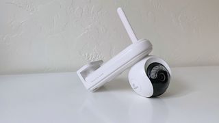 The Reolink Altas PT Ultra smart home camera on a white table