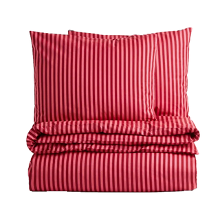 A candy cane striped pink and red bedding set