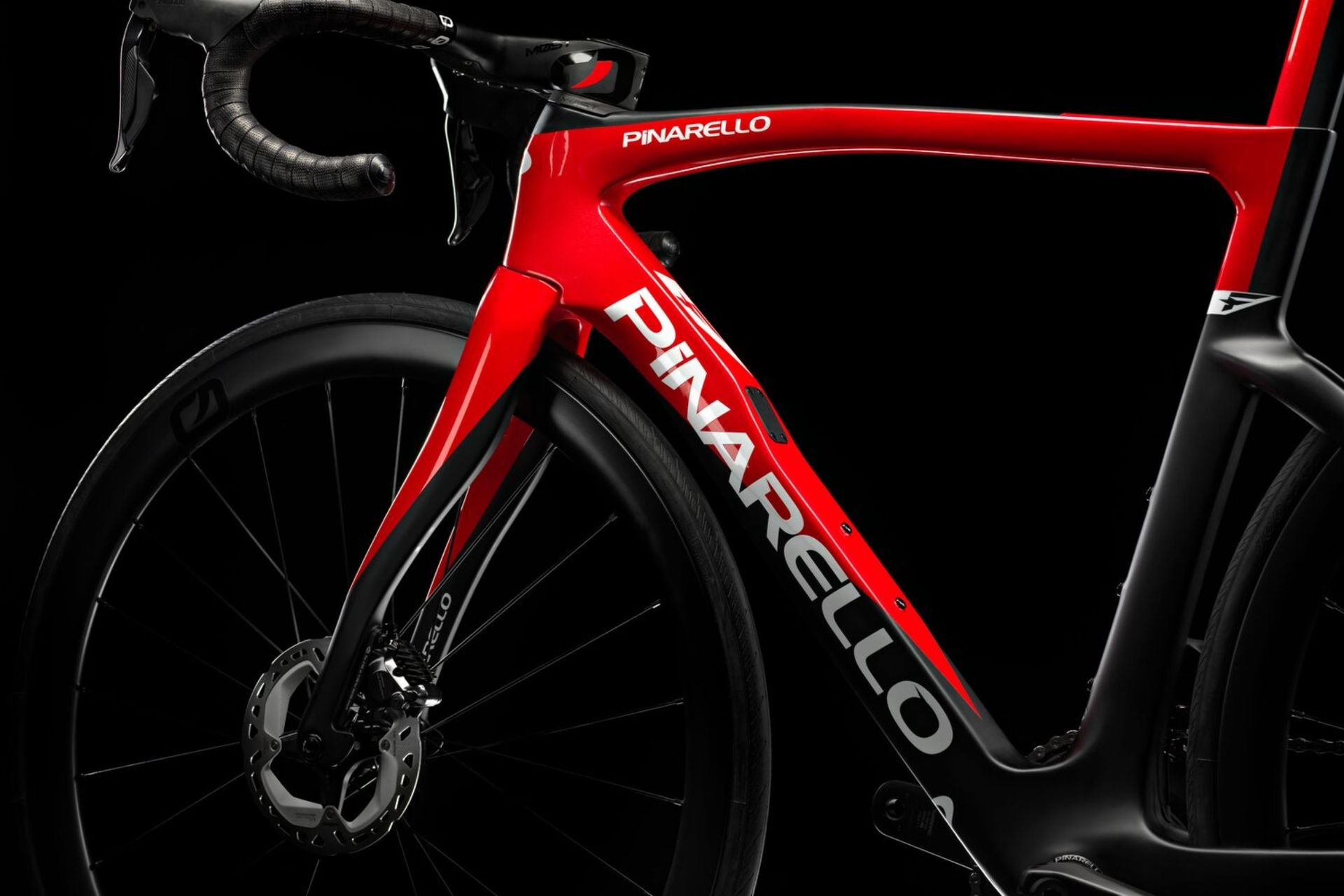 Image shows frame detail of the Pinarello F road bike in a red colour scheme