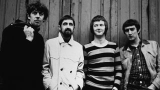 ock band the "Bluesbreakers" pose for a portrait in 1966 in London, England. L-R: John Mayall, Hughie Flint, Eric Clapton, John McVie.