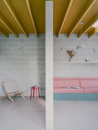 Triangle House by Artefact showing colour interiors and a graphic architectural approach that blends rawness and colour