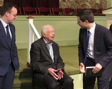 Former President Jimmy Carter meets with Pete Buttigieg and his husband, Chasten Buttigieg.