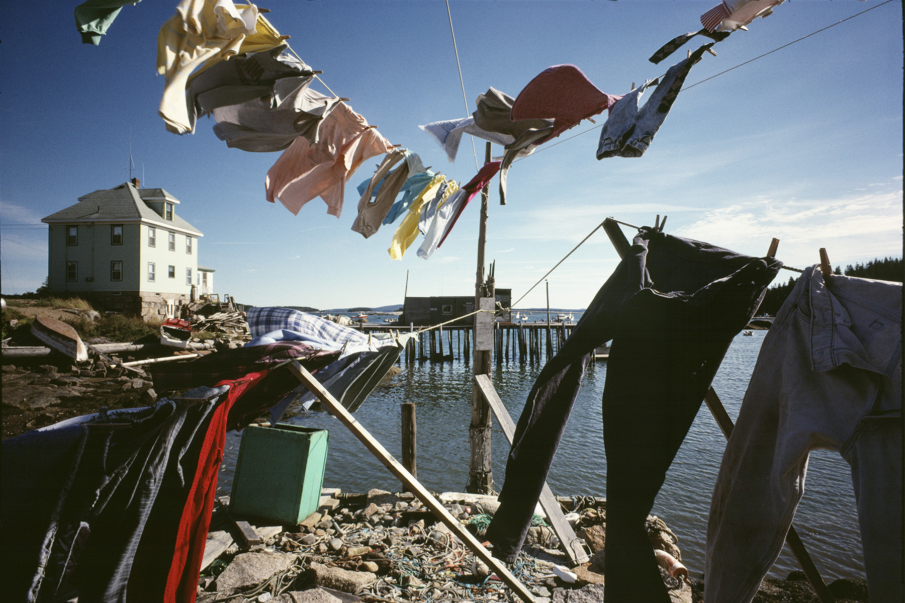 windswept clothing lines filled with colorful clothing