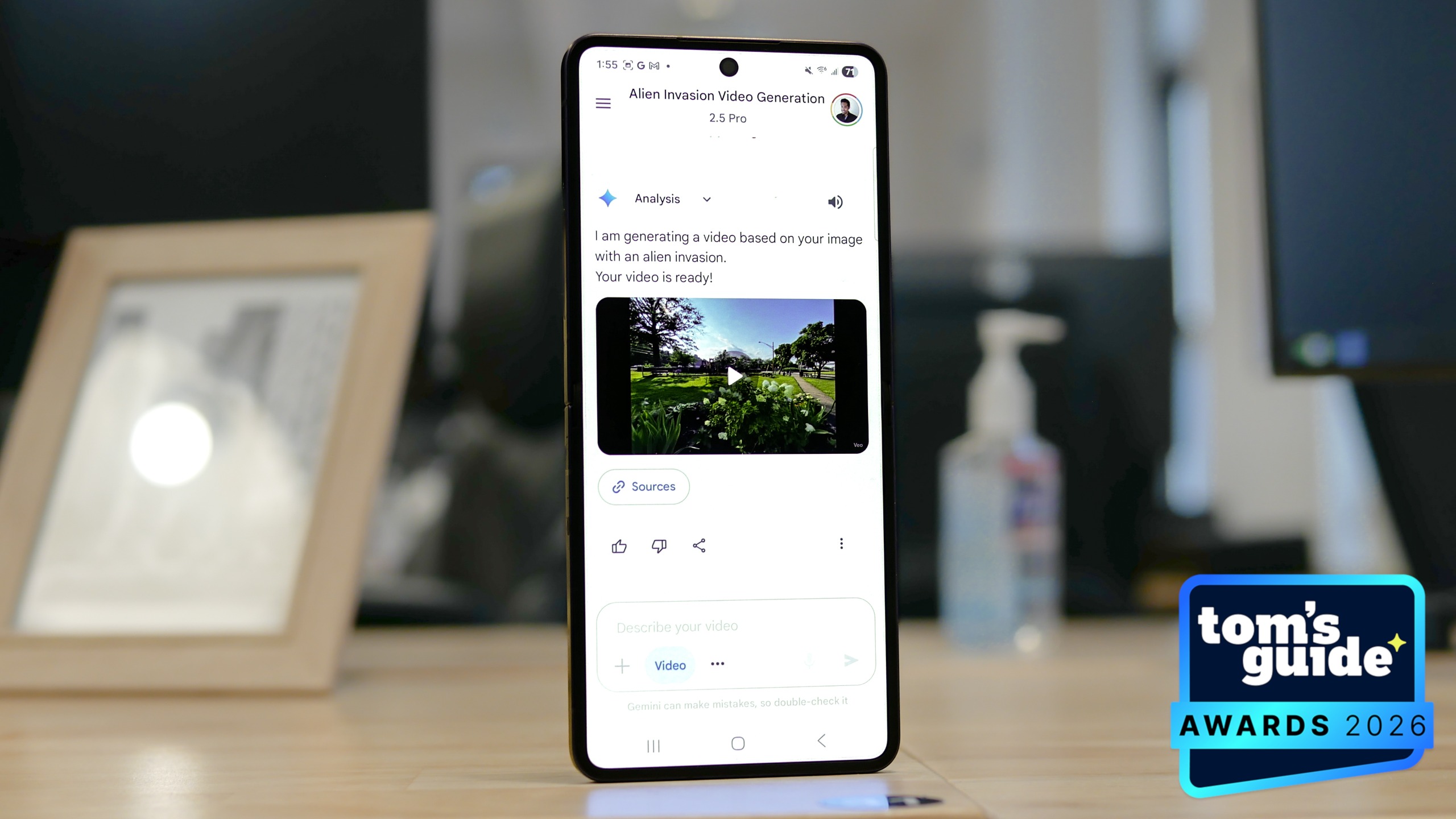 A phone generating an AI video using Veo 3.1 with a TG Awards 2026 badge