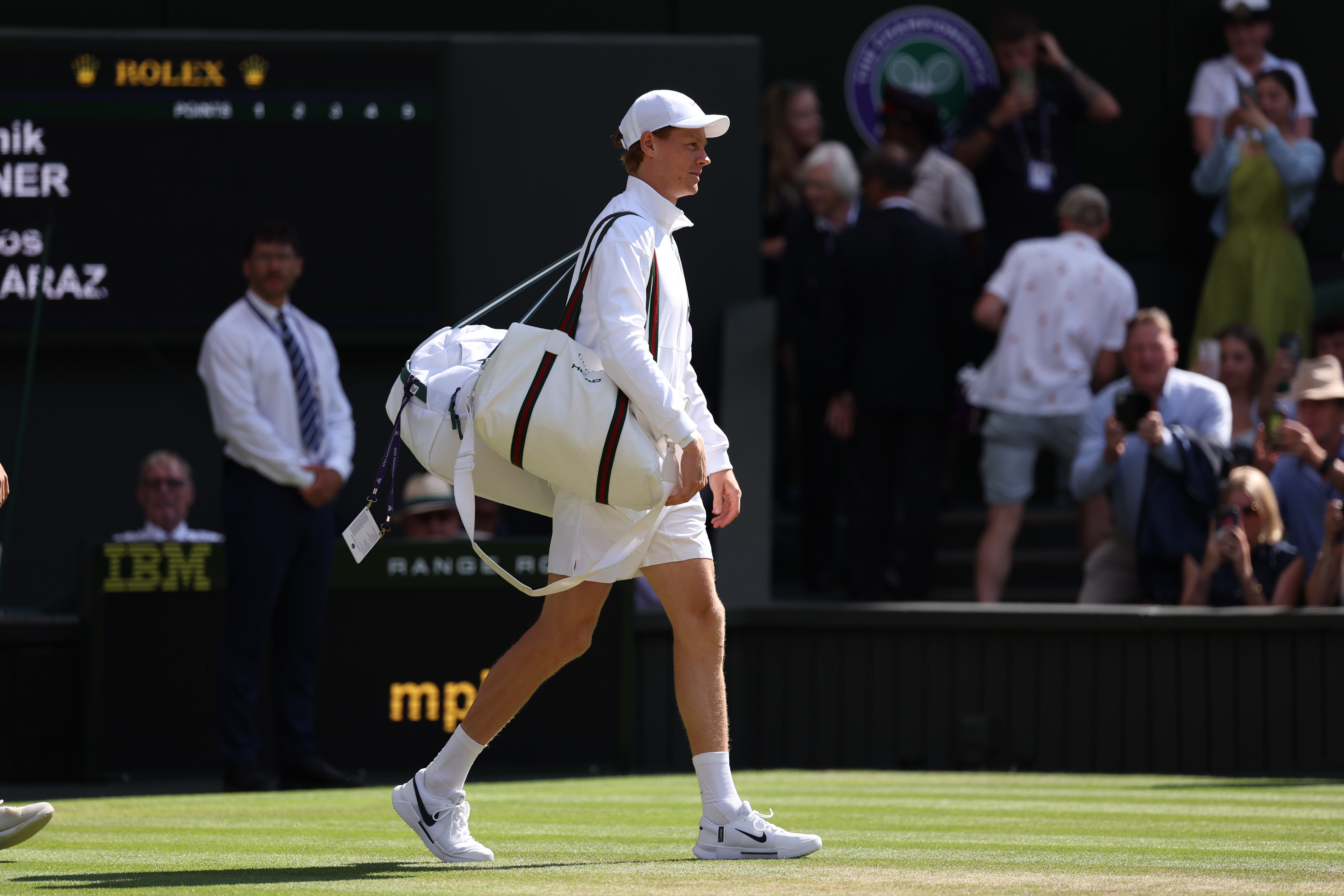 Jannik Sinner at Wimbledon wearing Nike and Gucci.