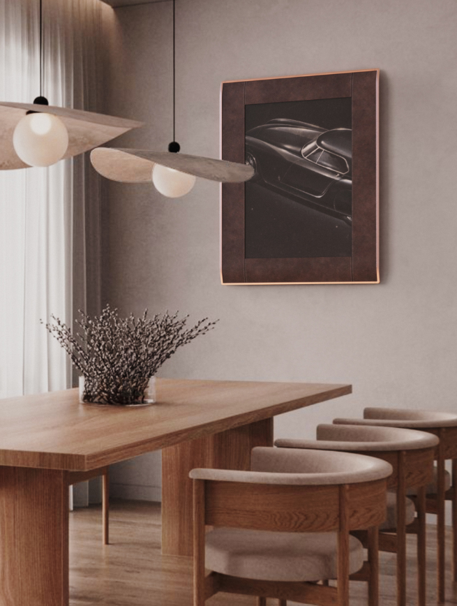 A digital art frame on a wall