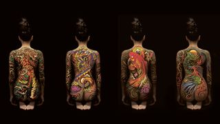 Four women with tattooed backs