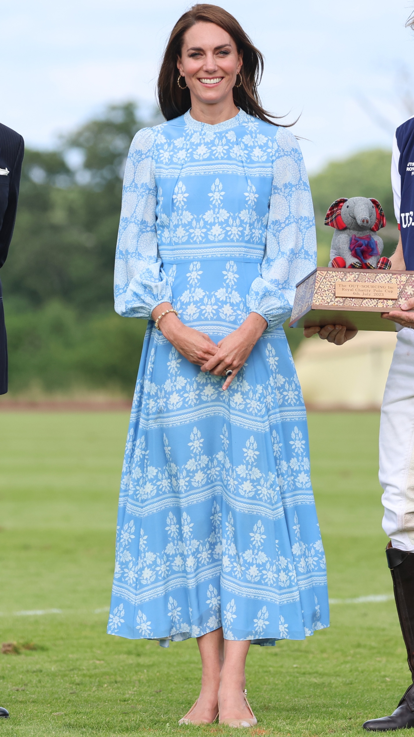 Catherine, Princess of Wales smiles for a photo at the Out-Sourcing Inc. Royal Charity Polo Cup 2023 at Guards Polo Club, Flemish Farm on July 6, 2023
