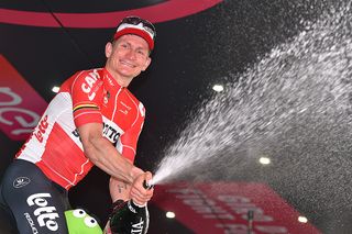 Andre Greipel (Lotto Soudal) sprays champaign after winning stage 5