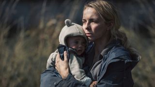 Jodie Comer with a baby in The End We Start From.