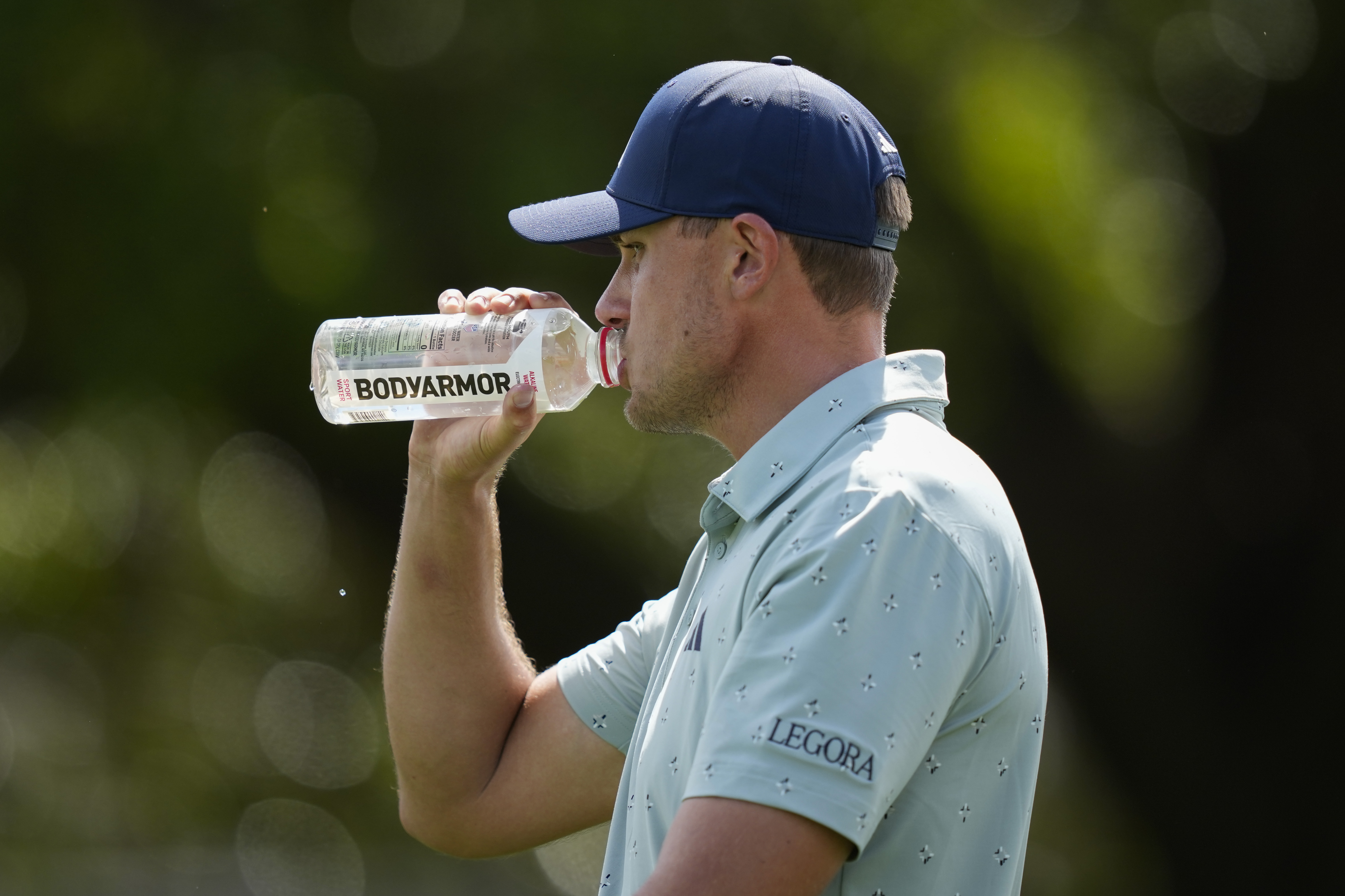 ORLANDO, FLORIDA - MARCH 06: Ludvig &amp;Aring;berg of Sweden takes a drink of Bodyarmror water on the 10th tee during the second round of the Arnold Palmer Invitational presented by Mastercard at Arnold Palmer&amp;amp;apos;s Bay Hill Club &amp;amp; Lodge on March 6, 2026 in Orlando, Florida. (Photo by Tracy Wilcox/PGA TOUR via Getty Images)