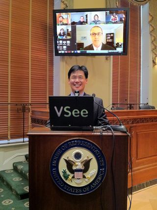 Milton Chen demonstrates VSee for the U. S. House of Representatives.