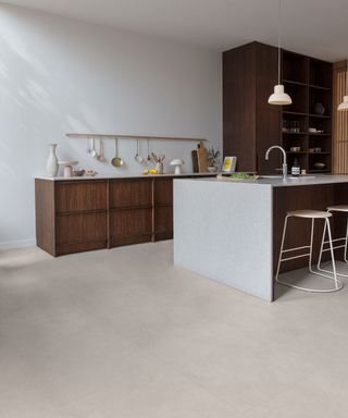 contemporary kitchen with neutral large format vinyl flooring