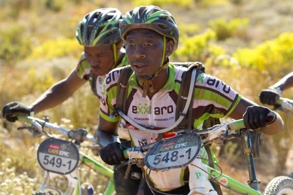 Bruce Malela leads teammate Musawenkosi Manana up a steep rocky climb