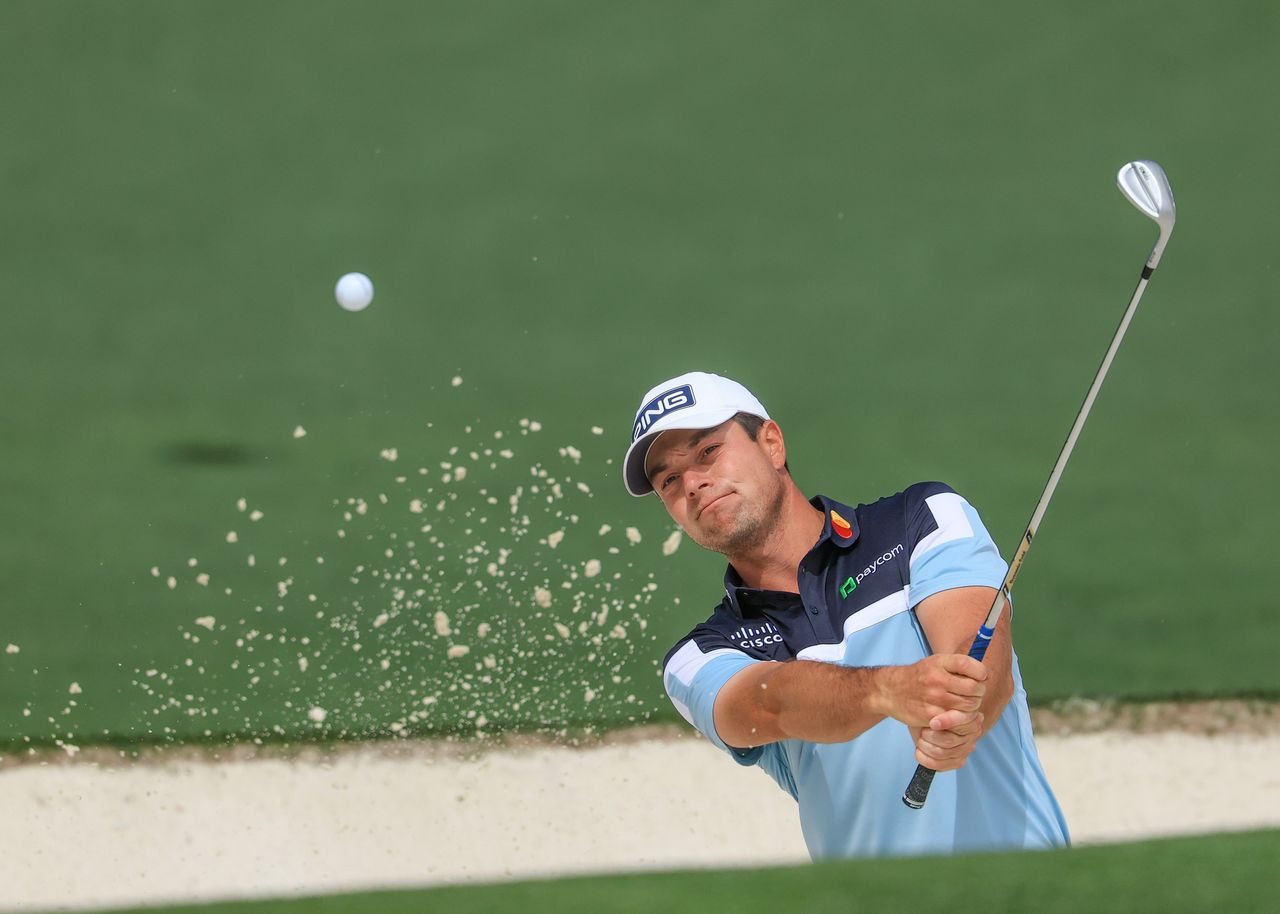Viktor Hovland plays a bunker shot on the third hole during a practice round prior to the 2026 Masters Tournament at Augusta National Golf Club