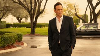 Vince Vaughn wearing a black suit and white shirt in Apple TV Plus comedy, "Bad Monkey"