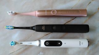 Ordo Sonic+, Philips Sonicare 9900 Prestige, and Oral-B Series 9 electric toothbrushes