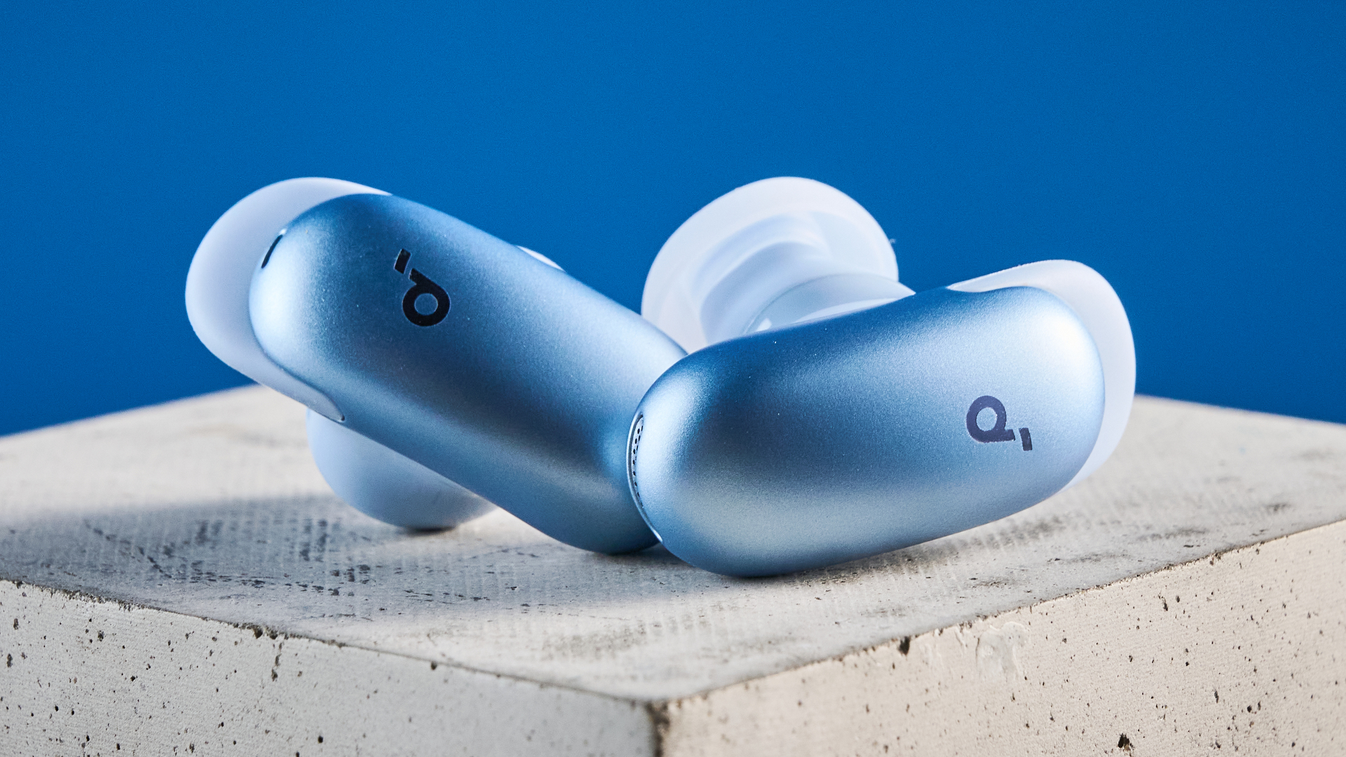 the soundcore liberty 5 pro in blue on a blue tom's guide background