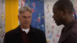 Sterling K. Brown in profile, talking to Mark Harmon in NCIS