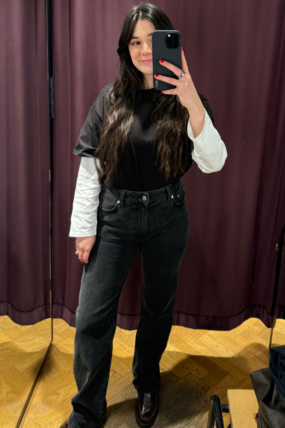 Sofia wearing black denim