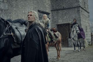 Geralt, Ciri and Yennefer near a stable with horses