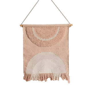 Tufted Urban Outfitters wall hanging with geometric arch shapes