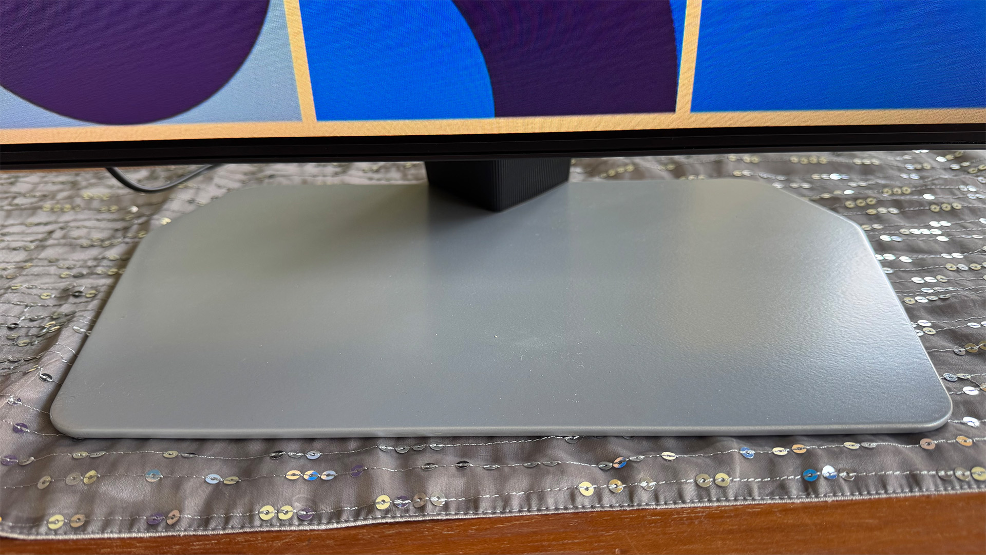Samsung QN90F Mini LED TV close up on pedestal stand