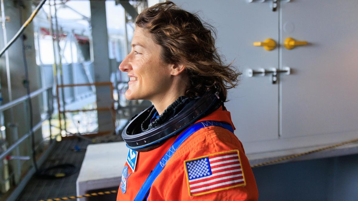 Artemis 2 moon astronaut Christina Koch, a mission specialist, stands on the mobile launcher at NASA's Kennedy Space Center in Florida on Sept. 20, 2023. She and the rest of the crew were doing a launch simulation.