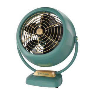 a green vintage fan with gold accents, designed to improve ventilation in the home