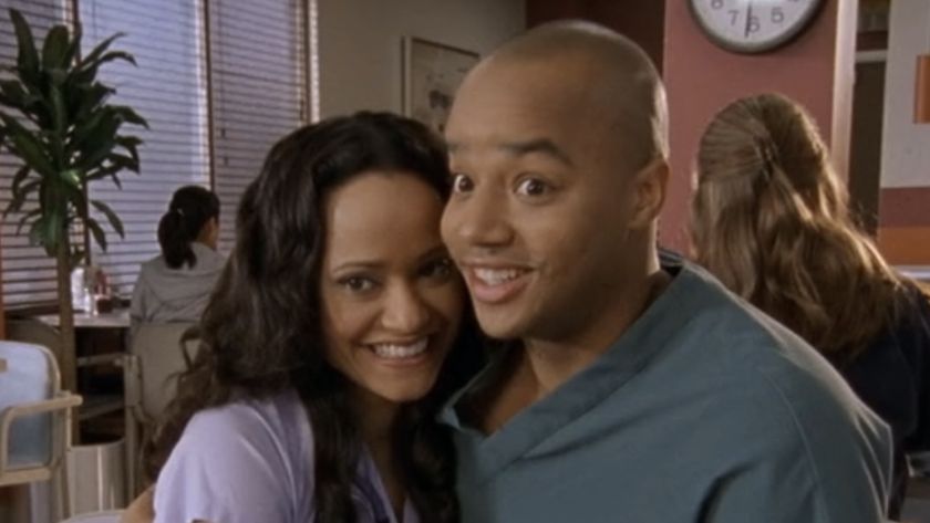 Turk and Carla smiling at JD in Scrubs