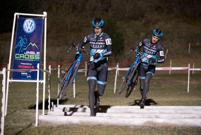 Ben Berden and James Driscoll run over the Yule Log barriers.