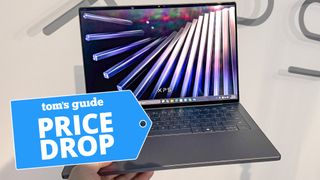 XPS 14 2026 laptop held in hand