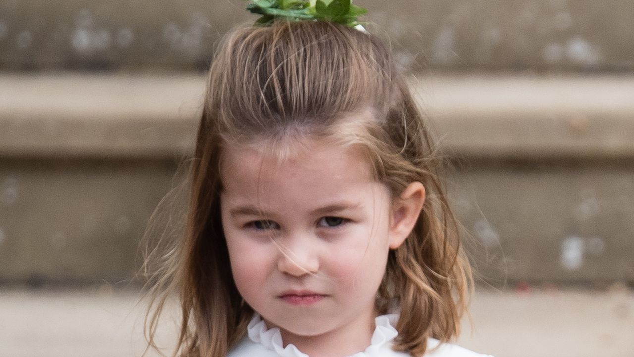 Princess Charlotte of Cambridge attends the wedding of Princess Eugenie of York and Jack Brooksbank at St George&#039;s Chapel in Windsor Castle