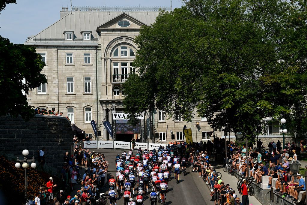 QUEBEC CITY QUEBEC SEPTEMBER 09 A general view of the peloton passing through Qubec City during the 11th Grand Prix Cycliste de Qubec 2022 a 2016km one day race from Quebec to Quebec GPCQM on September 09 2022 in Quebec City Quebec Photo by Dario BelingheriGetty Images