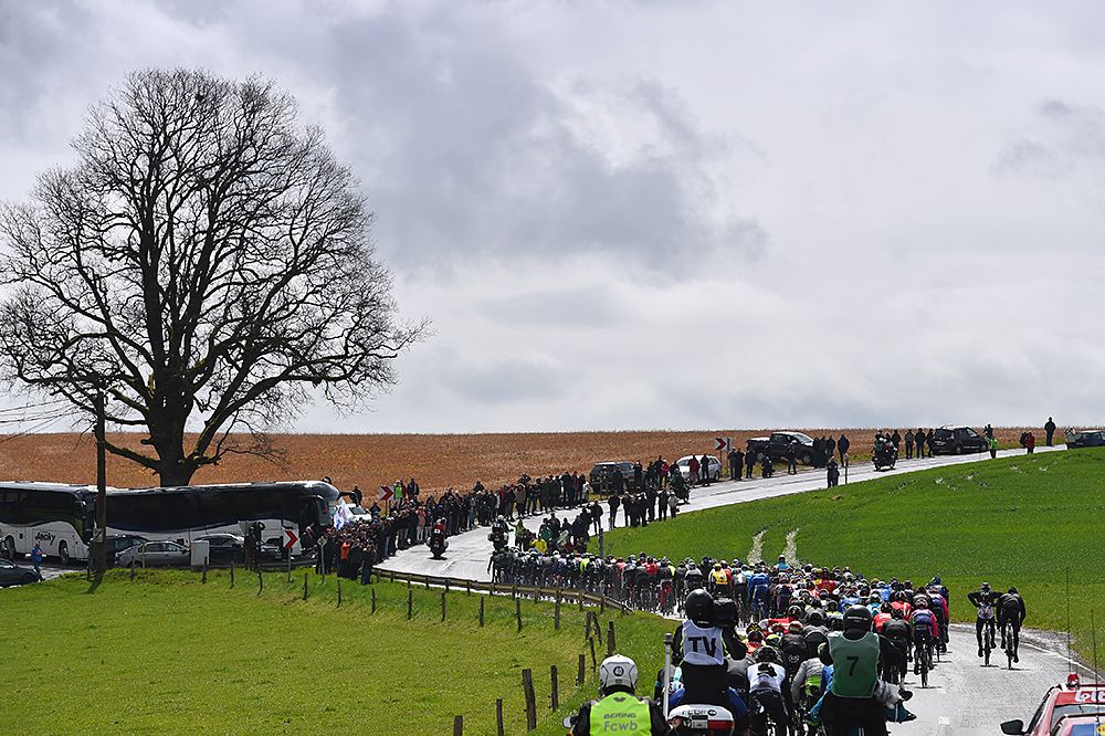 The peloton rides through twisty roads at Liege-Bastogne-Liege